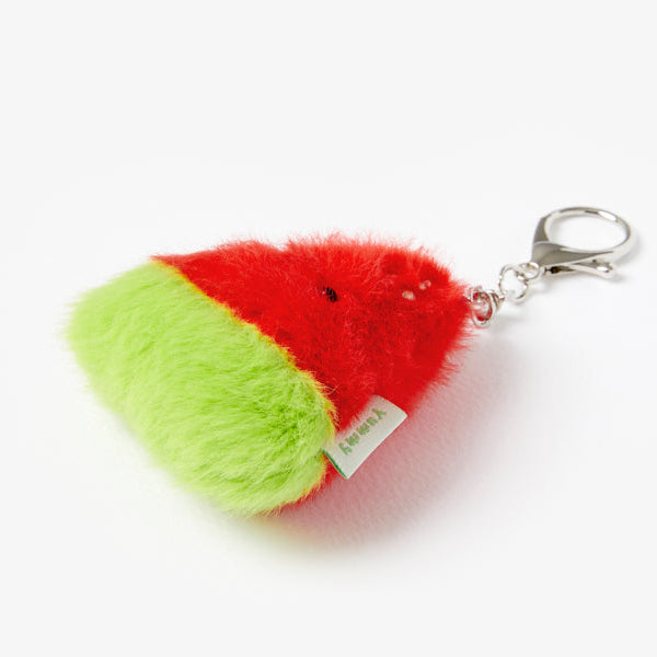 Watermelon-shaped keychain on a white background