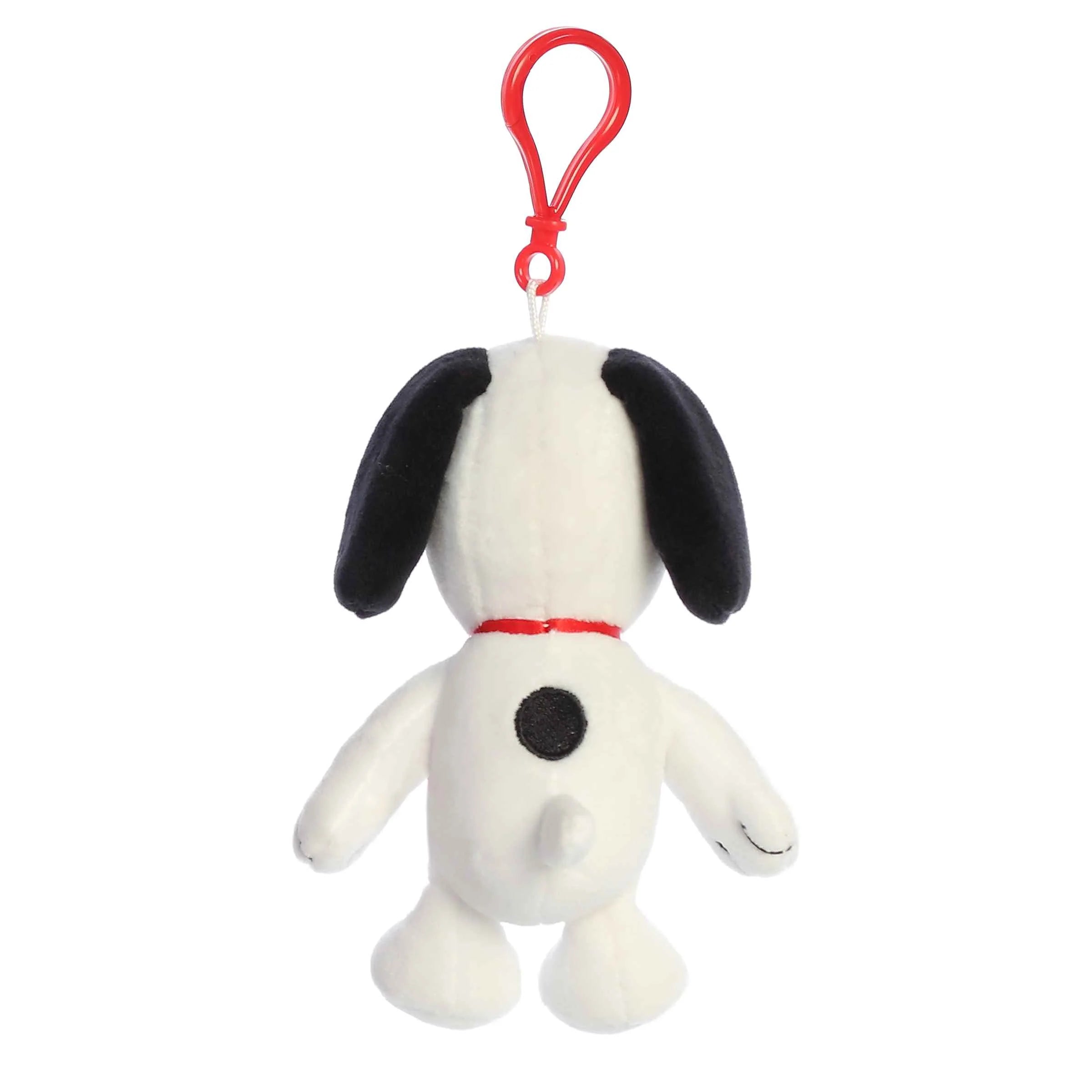 Plush Snoopy bag charm with a red clip on a white background