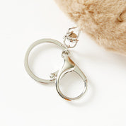 Silver teardrop-shaped chain on a white background