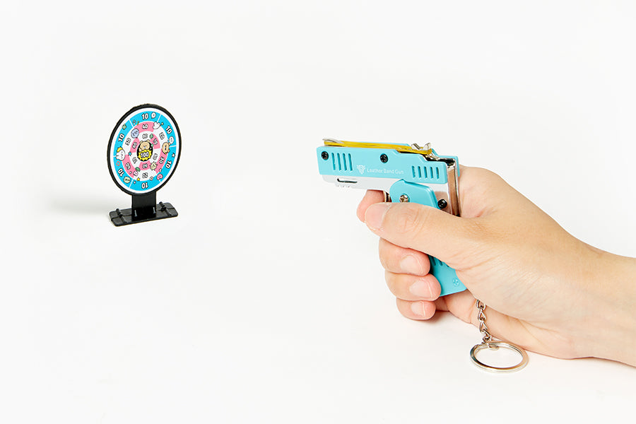RUBBER GUN SPIN GAME