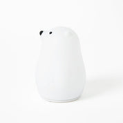 White bear night light with black accents on a white background