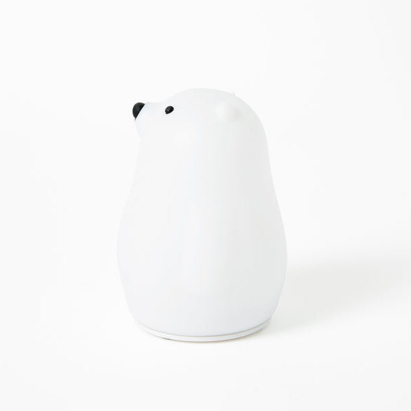 White bear night light with black accents on a white background