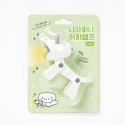 LED mini lamp packaging with cartoon character on a light green background