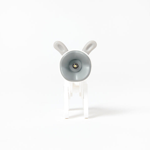 Dog-shaped night light with a white background