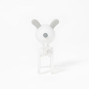 White dog-shaped night light on a white background