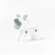 White and gray dog-shaped night light on a white background