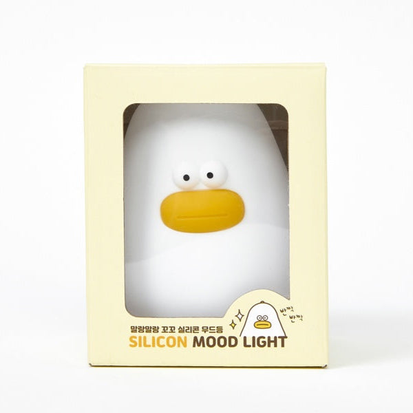 Silicon mood light in a yellow box on a white background