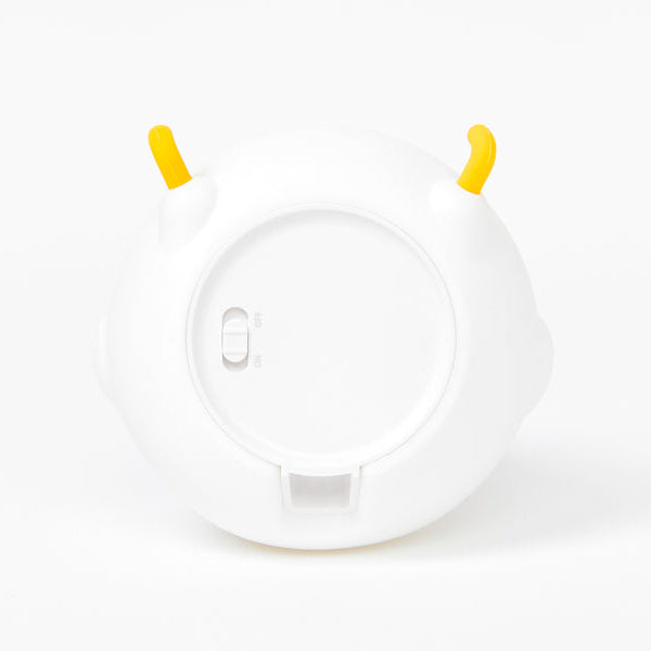 Bottom of White moodl light with yellow accents on a white background