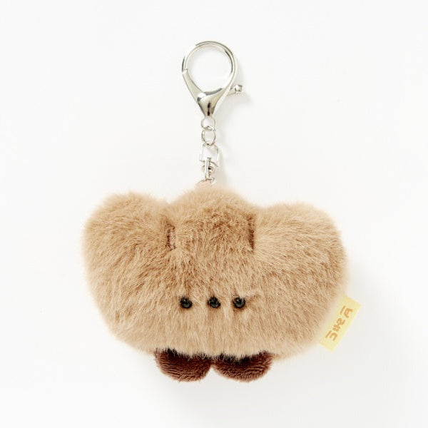 Plush Bread keychain with a tag on a white background