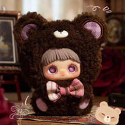 Stuffed toy with bear costume and character inside, set against a blurred indoor background.
