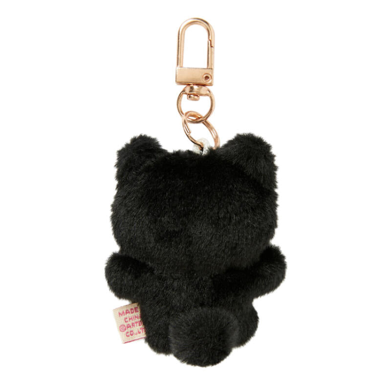 Black fluffy keychain with a gold clasp on a white background