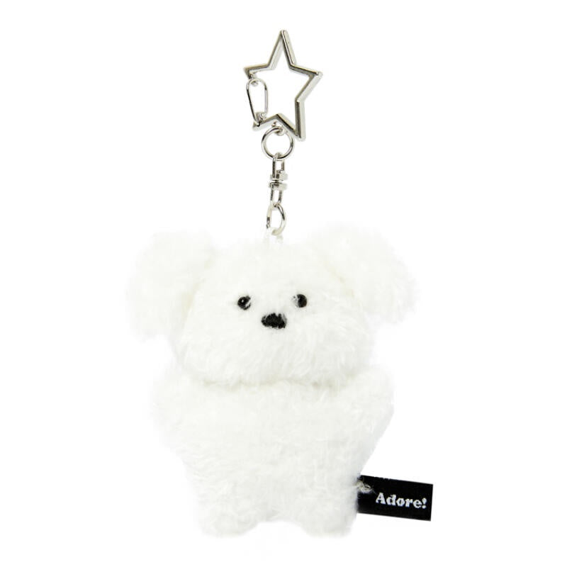 White fluffy keychain with a star-shaped clip on a white background