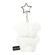 White fluffy keychain with a star-shaped charm on a white background