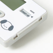 Digital timer with a cartoon face on a white background