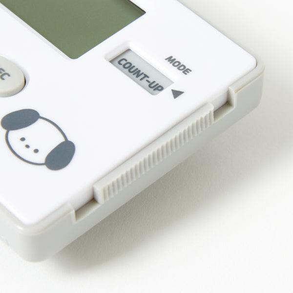 Digital timer with a cartoon face on a white background