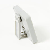 White electronic device with a screen on a white background